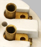 Inflexible tube socket contacts